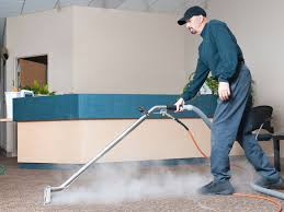 Maseeng technician cleaning a corporate office floor